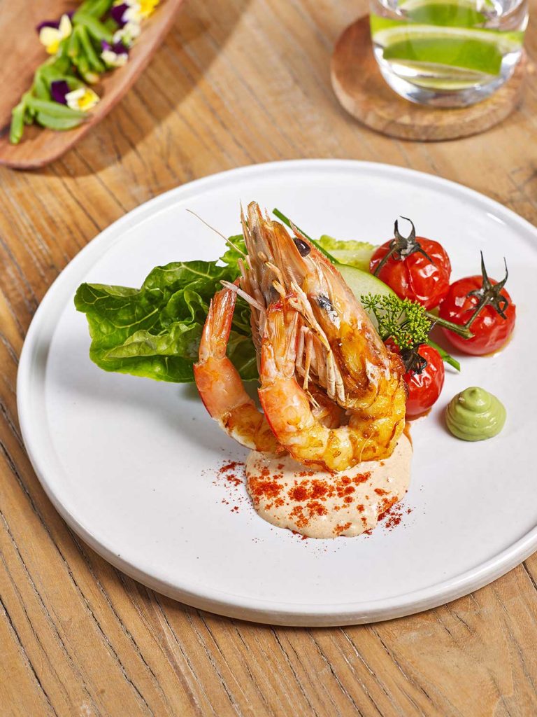 Plated Prawn Cocktail with roasted tomato Marie Rose sauce, avocado cream
